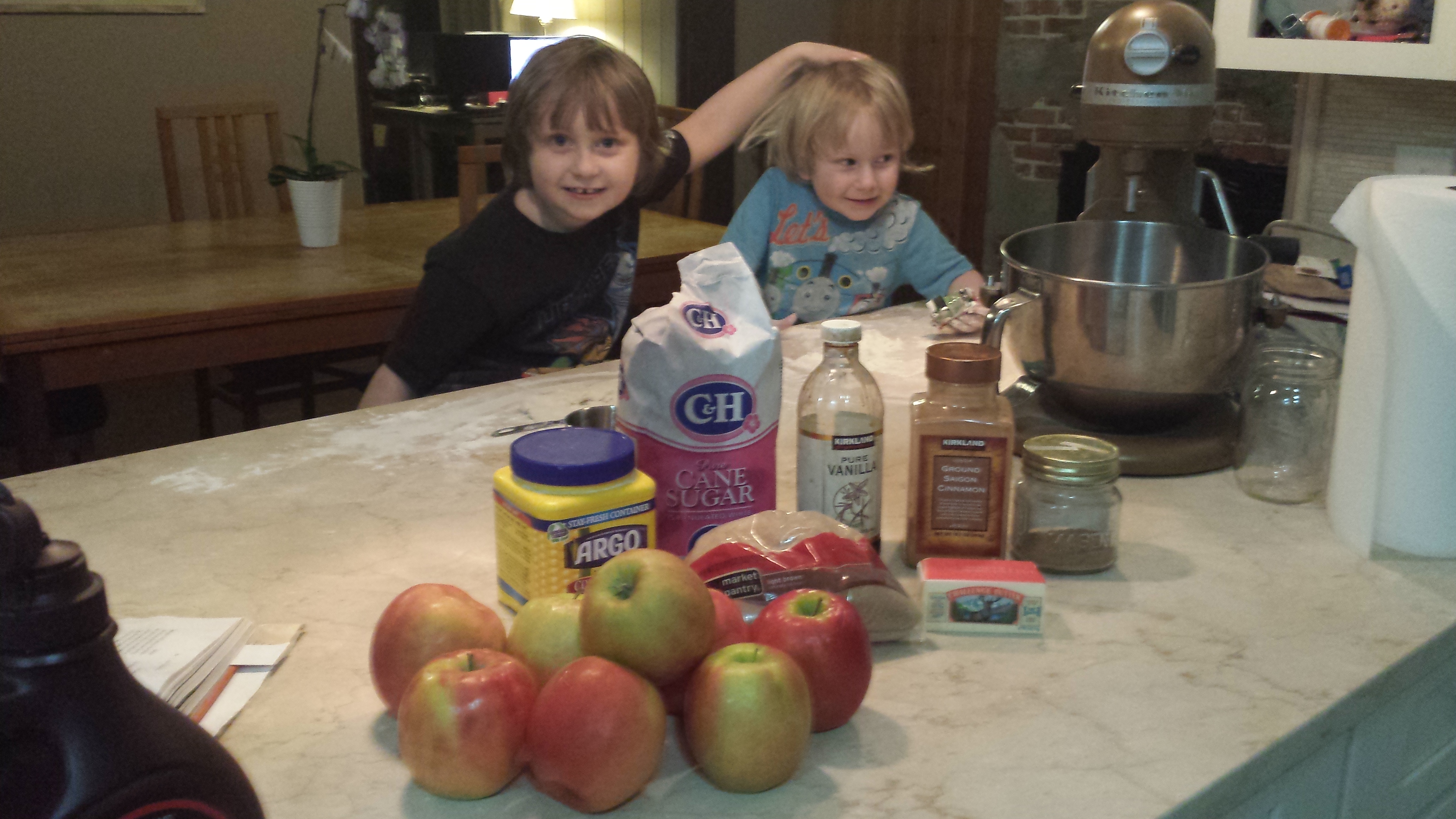 Carolyn and family make an apple pie