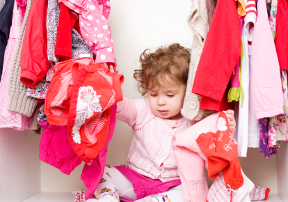 Baby girl in closet