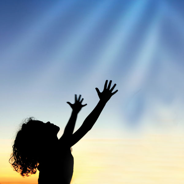 Girl reaching to heaven