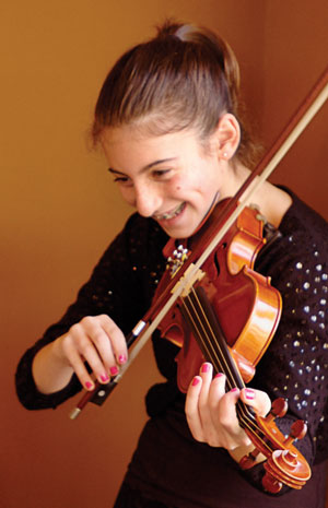 Tween playing violin