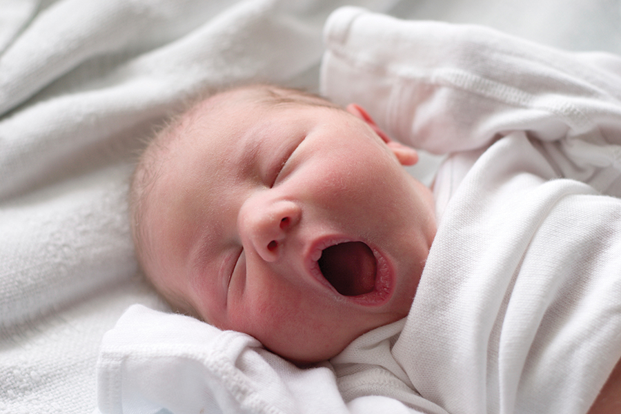 yawning newborn