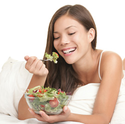 Woman eating a salad