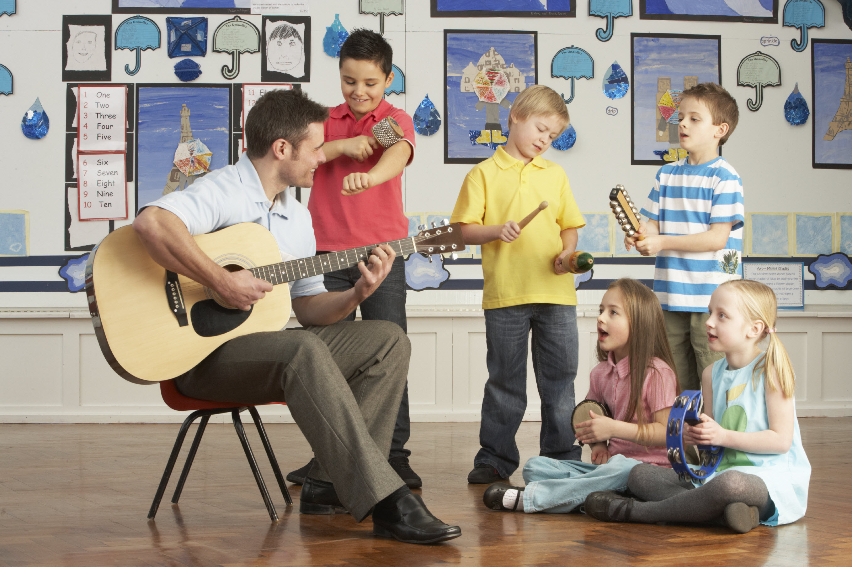 Student learning music and instruments in school