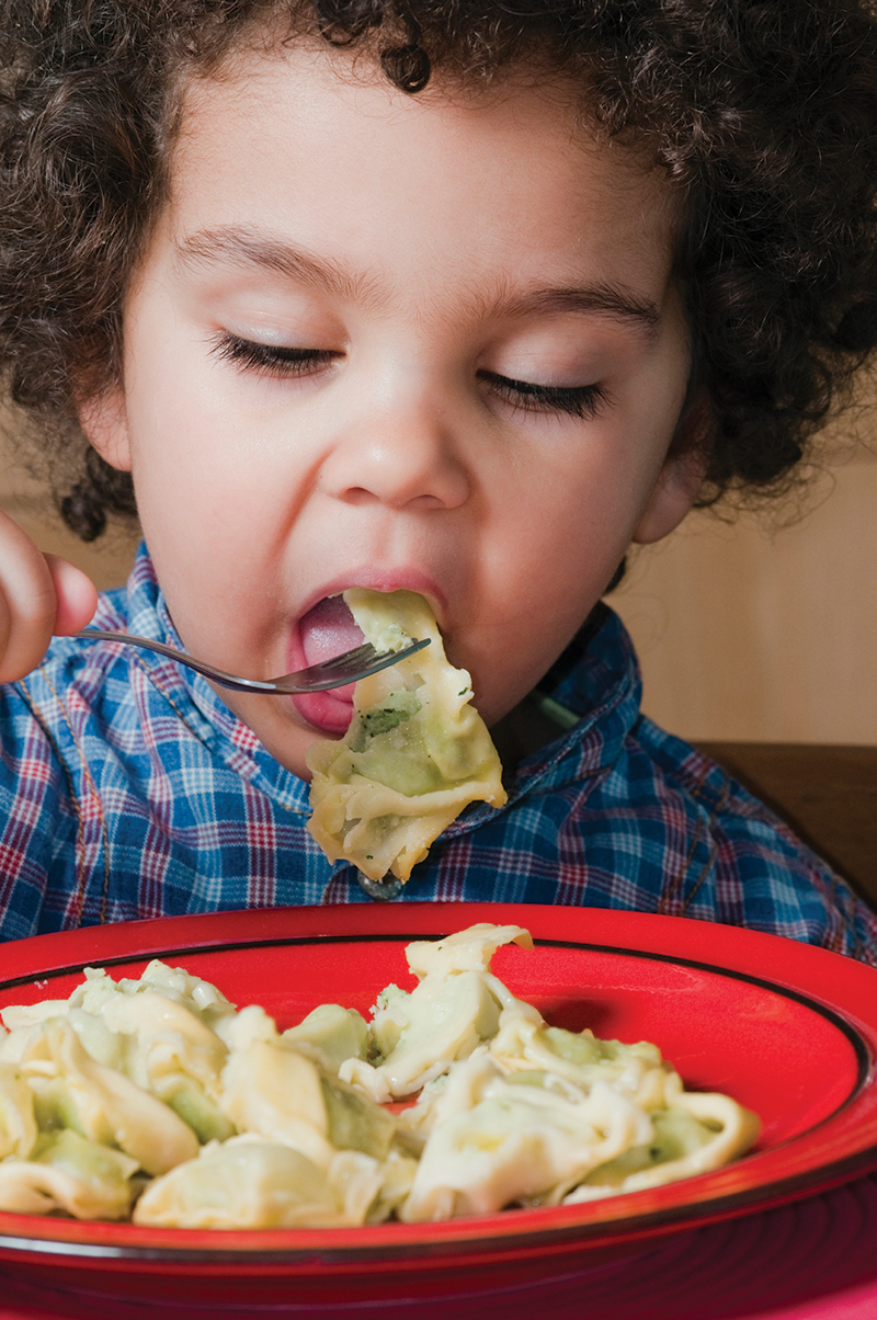 cute kid with salad