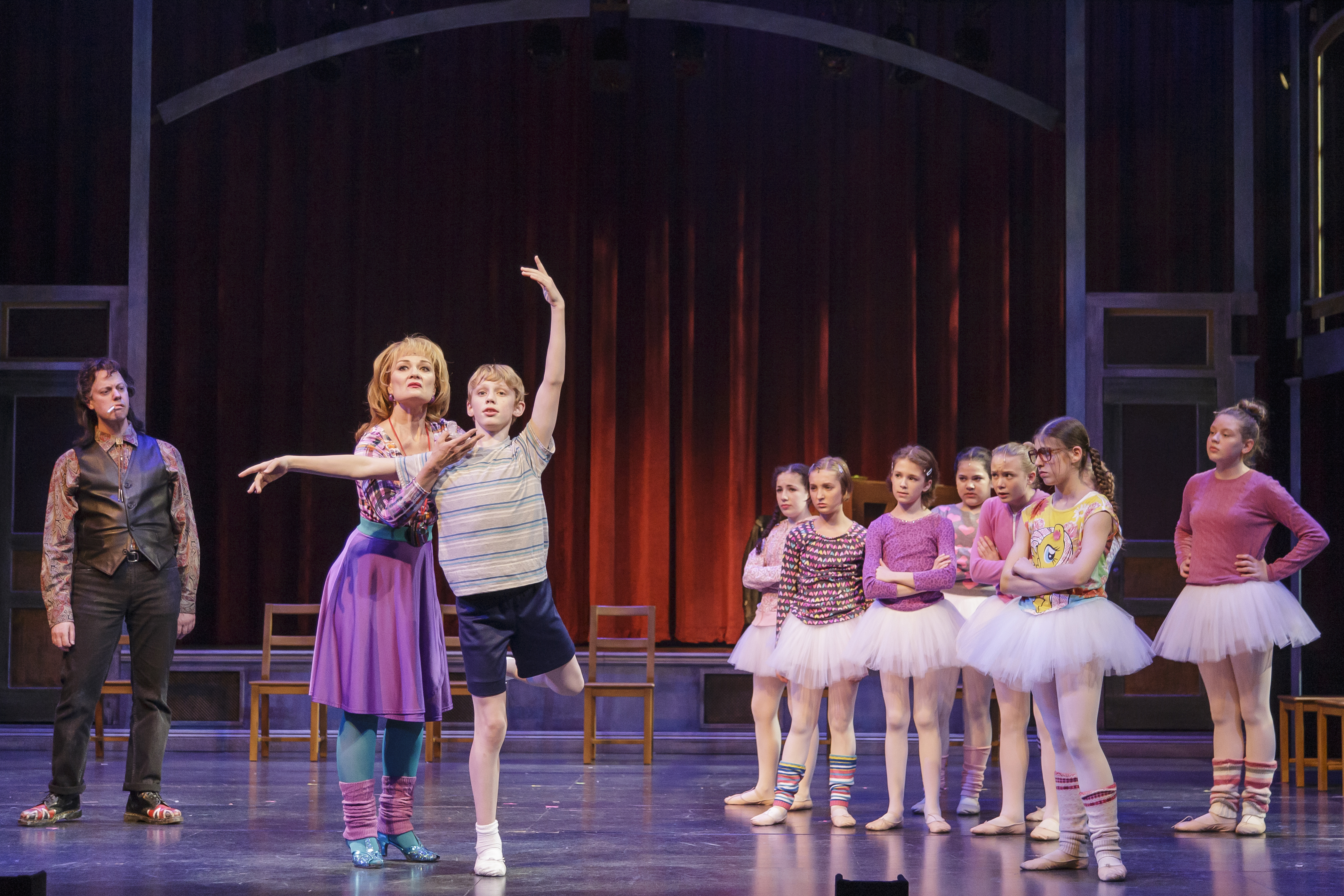 Greg McCormick Allen (Mr. Braithwaithe), Mari Nelson (Mrs. Wilkinson), Philipp Mergener (Billy Elliot), Eliana Coe, Priya Niehaus, Lacey Krueger, Charlie Ganz, Eden Vold, and Cordelia Janow (Ballet Girls), and Jasmine Harrick (Debbie Wilkinson).  Billy Elliot the Musical Production photo. © 2016 Mark Kitaoka. 