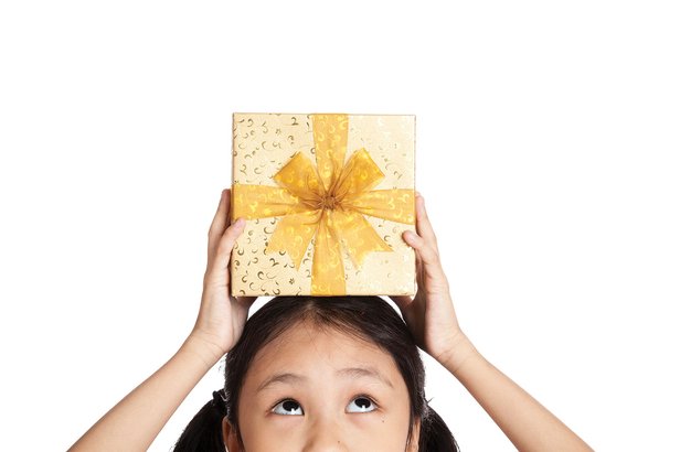 Girl with yellow present on top of her head