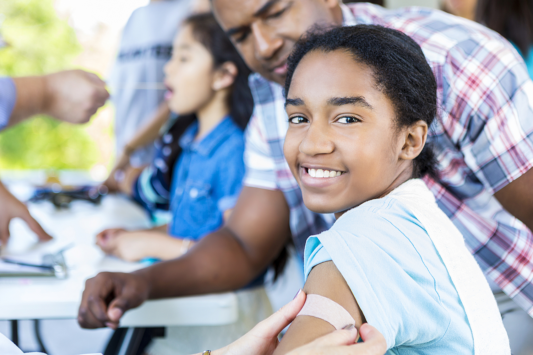 girl getting flu shot