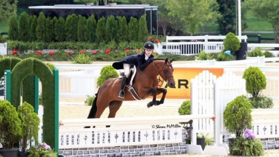 Haley Foster competes in an equestian event