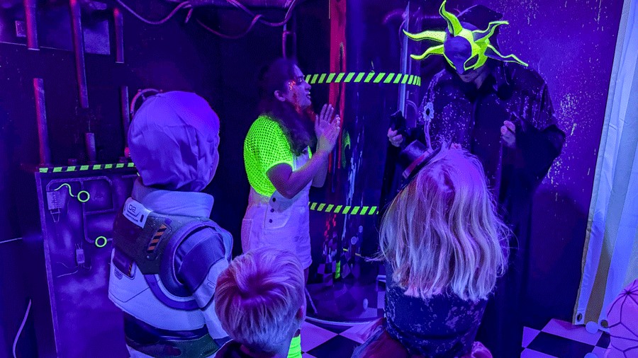 "Actors performing at Cosmic Carnival, a Seattle experience for families"