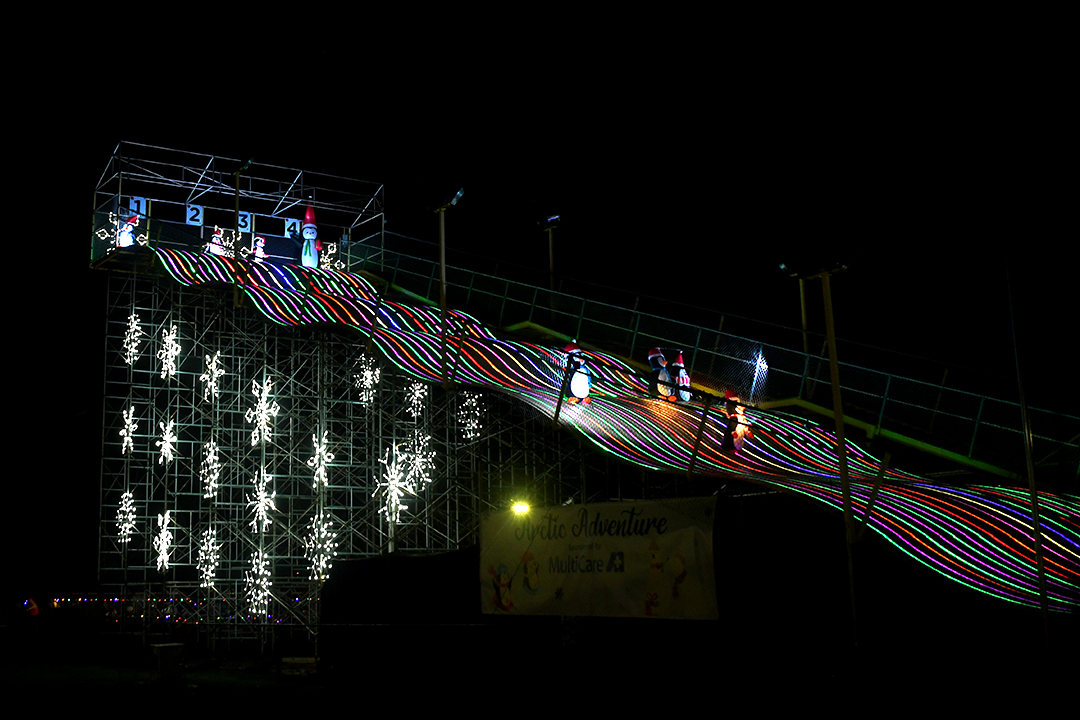 penguins on the slide at holiday magic at the fair holiday fun for seattle area families