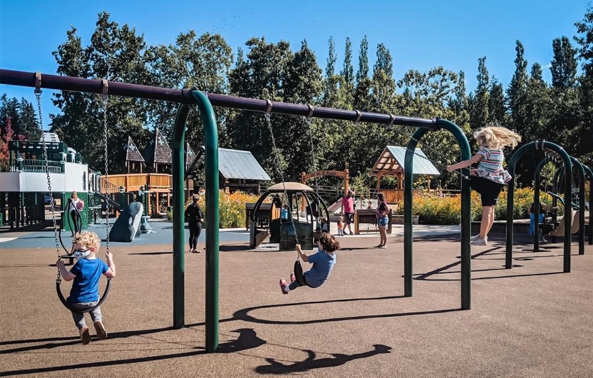 Block of swings for kids and babies at new ferry boat playground on Bainbridge Island near Seattle kids and families