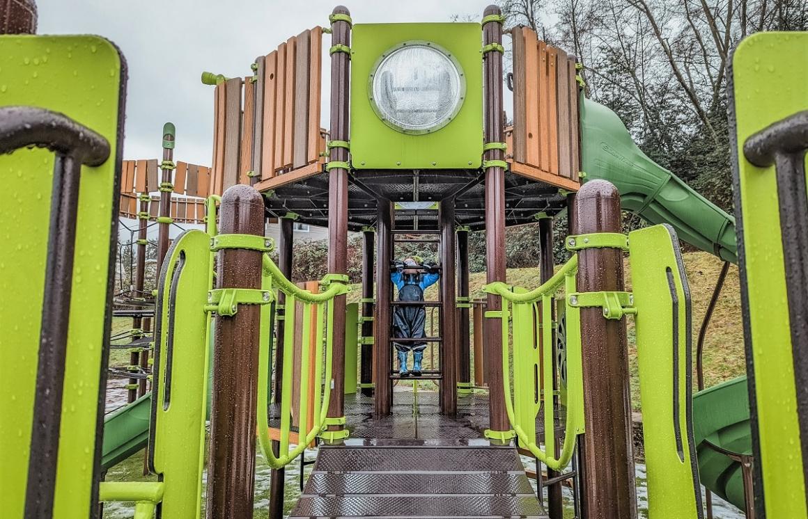 Closeup view of bridge feature on play structure at new Lakeridge Playground Rainier Beach neighborhood Seattle kids families