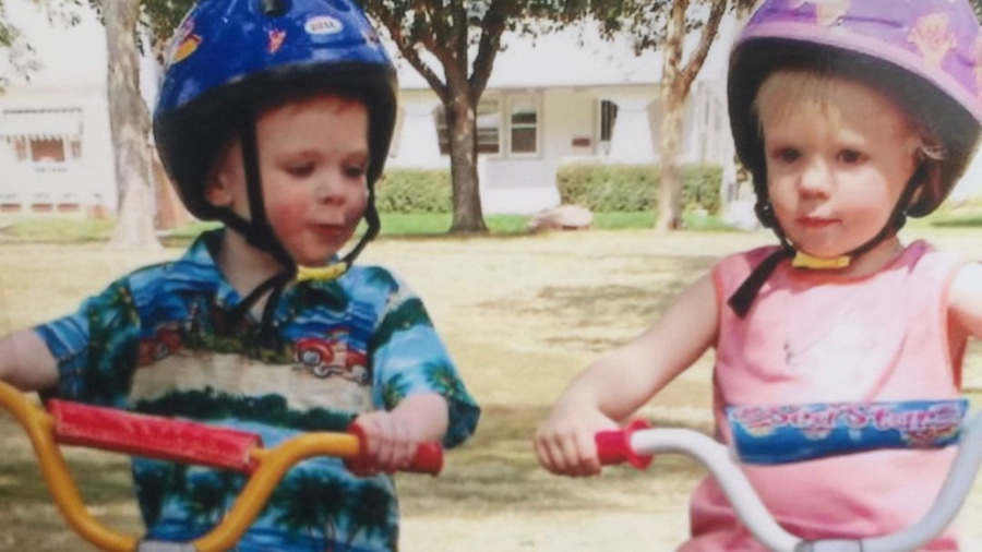 Twins Max (left) and Lucy Murrell take their bikes for a spin as children. 