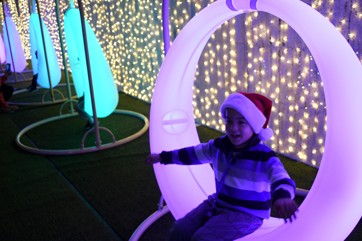 Lumaze-light-swing-play-area-Enchant-seattle-which-light-show-better-kids-families