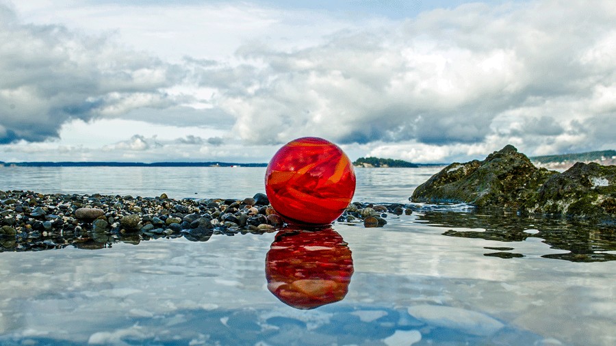 Handblown glass float on a Camano Island beach