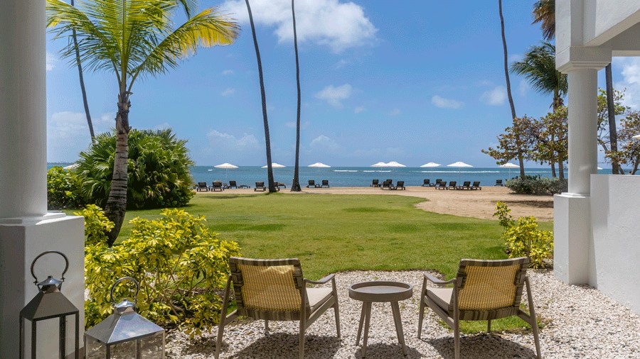 Beach views from the Hyatt Regency Grand Reserve Puerto Rico with palm trees