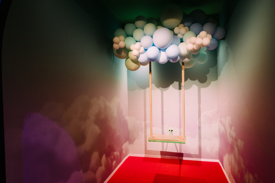 a swing hanging below a bubble cloud display