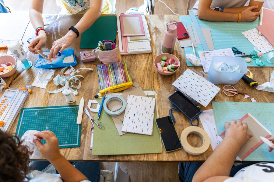 a table covered with craft supplies