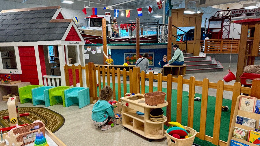 young girl playing in toddler area of Children’s Museum of Skagit County, a North Sound museum you van visit for free on the second Tuesday of each month