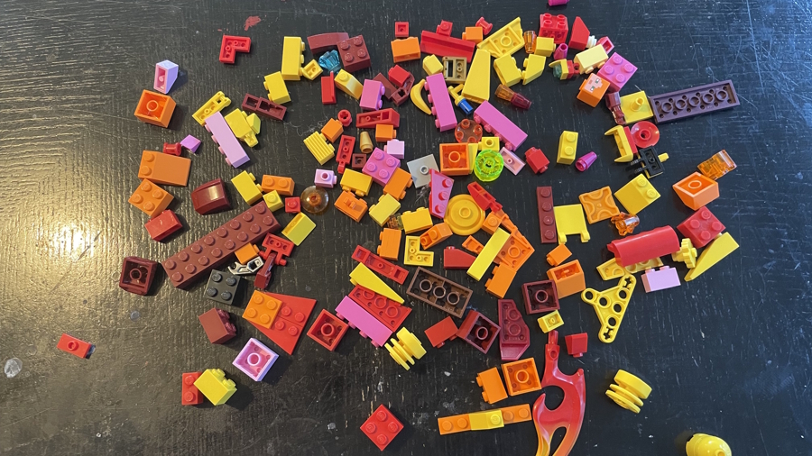 a pile of Lego bricks on a table