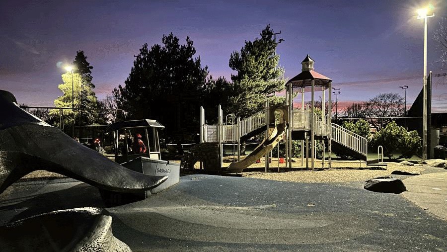 Alki Whale Tail Park and Playground is well lit at night for evening playtime near Seattle