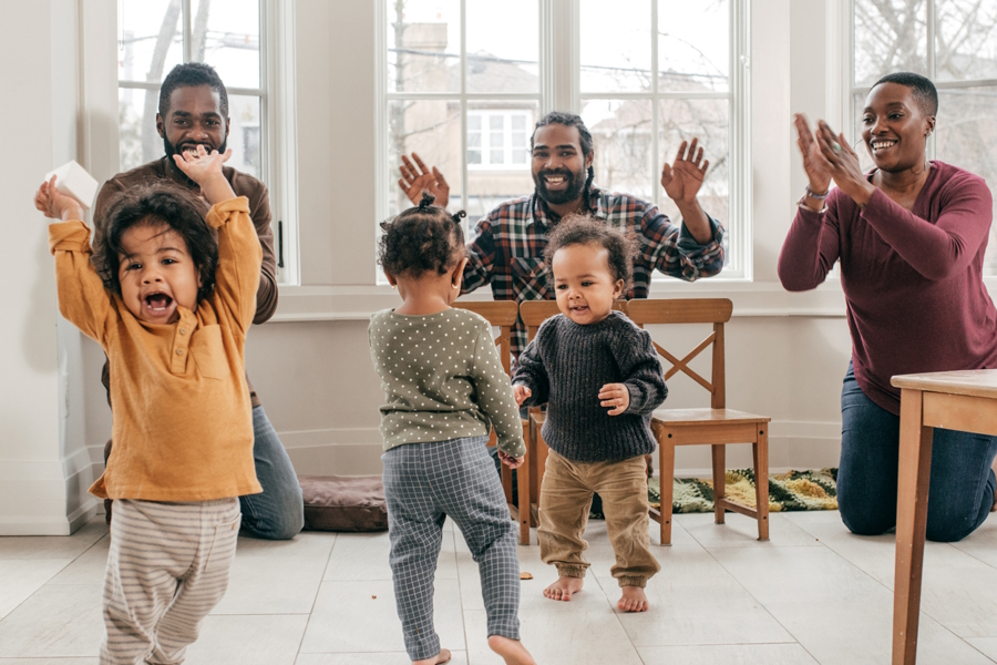 Parents and toddlers dance together