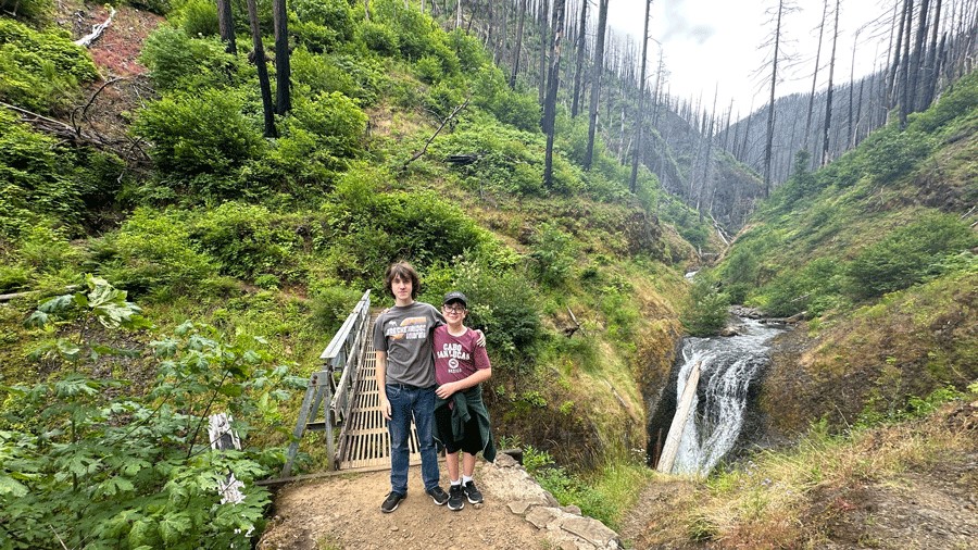 kids at a waterfall in the Columbia River Gorge, an attraction near Vancouver, Washington