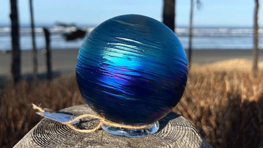 Seabrook glass float with a view of the beach